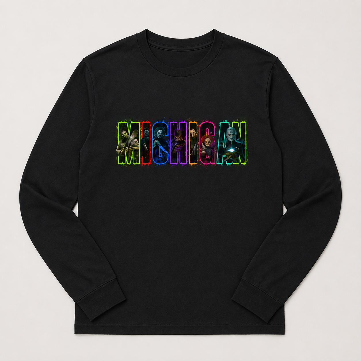 A black long-sleeve crewneck shirt with a colorful graphic on the chest spelling 'MICHIGAN' in neon-style letters filled with character illustrations, shown on a light gray background.